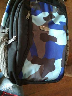Black, Blue, And Brown Camouflaged Backpack