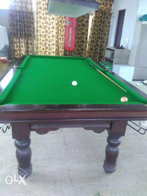 Brown Wooden Pool Table With Green Felt