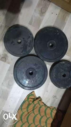 Four Black Steel Gym Plates