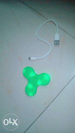 Green fidget spinner new,with charging cabel