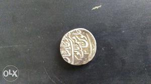 Its a very old coin, usdu m likha h kuch kya