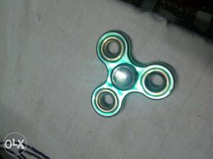 Only one week old green and Golden hand spinner