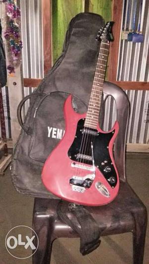 Red Electric Guitar With Black Case