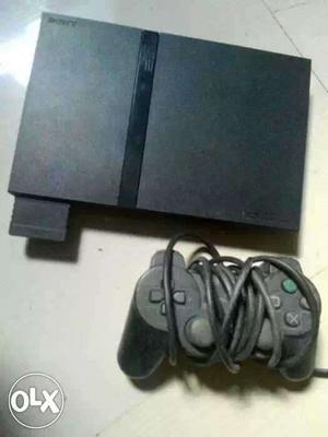 Sony ps2 with one joystick, power cable nd 8mb