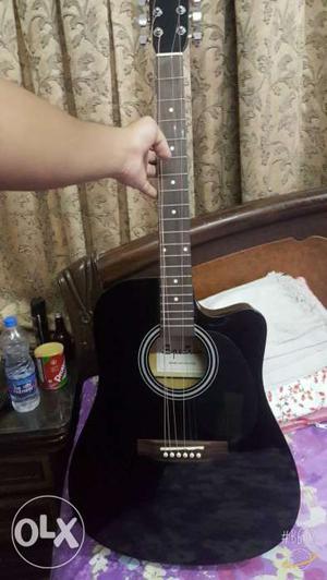 Spectrum guitar with belt, bag and tuner 9mnth old..still