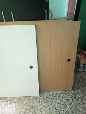 Two White And Brown Wooden Board