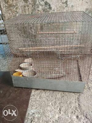 Brown And Gray Metal Cage