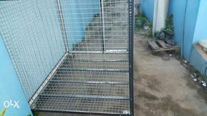 Gray And Black Steel Cage. Price negotiable 5x4x4 ft(lxwxh)