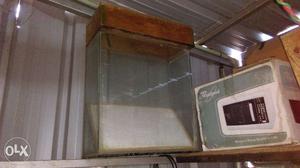 Low prize fish tank with flat top wooden set