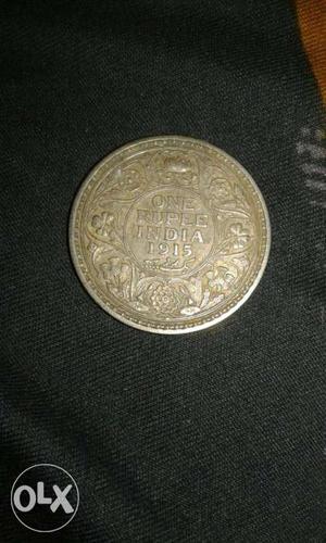 102 year's old coin (george v king emperor) in