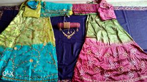 2 ghagra& blouses with stich.4 bangals r gold