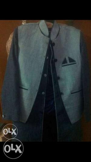 A brand new western dress in blue colour for man.