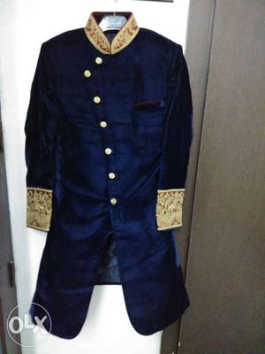 A ethnic royal blue sherwani with lower outfit...