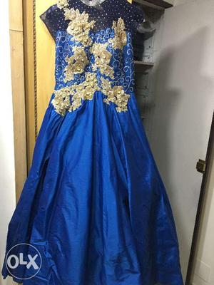 Beautiful blue gown, never used.