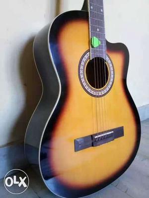 Black And Orange Cutaway Acoustic Guitar