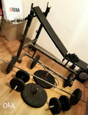 Black Bench Press With Adjustable Dumbbell And Barbell Lot