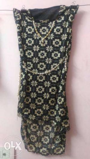 Black and gold top...