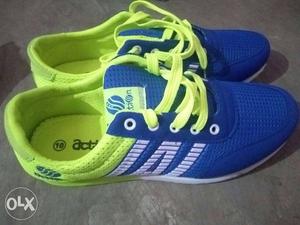 Blue, White And Green Running Shoe. Market Price- 999.
