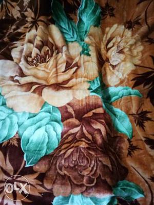 Brown And Teal Floral Textile