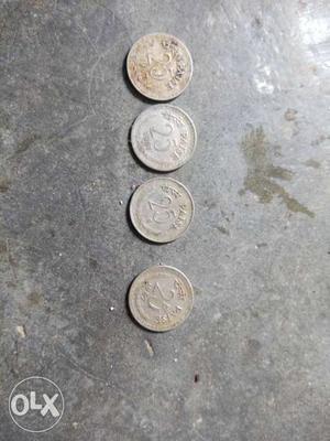 Four 25 Indian Coins