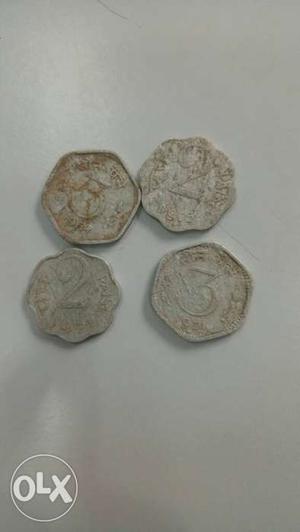 Four Silver-colored Indian Coins