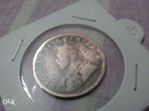 **George V**One quarter Anna coin