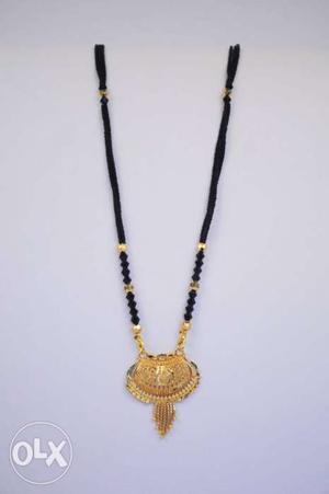 Gold Necklace With Black Strap