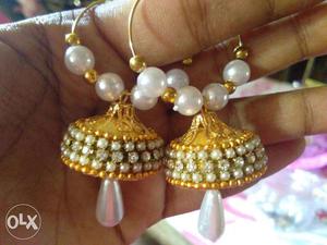 Gold-colored-and-white Jhumka Earrings