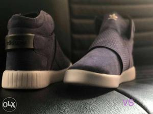 Gray-and-white Adidas Yeezy Boost 750's