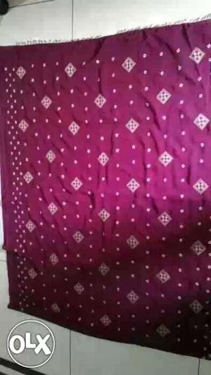 Maroon And Silver Textile