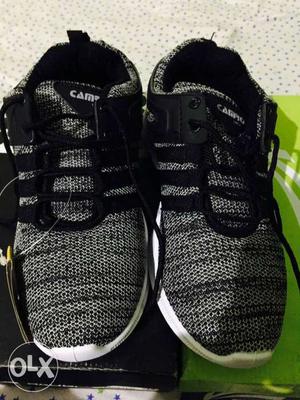 Pair Of Gray-and-black Running Shoes