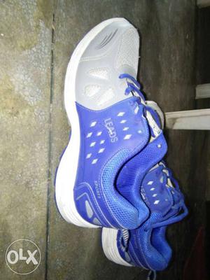 Pair Of Gray-and-purple Athletic Shoes