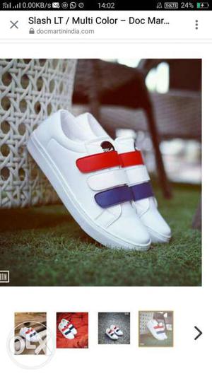 Pair Of White, Red And Blue Sneakers