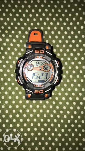 Round Black And Orange Digital Watch