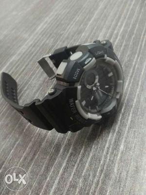 Round Black And White Sports Watch With Rubber Strap