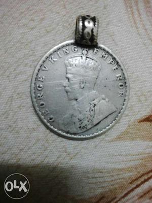 Round Silver-colored Coin Pendant