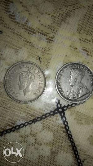 Two Round Gray Coins