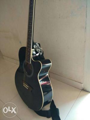Xtag guitar with cover and belt