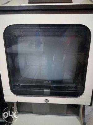 21" coloured TV with stand for sale
