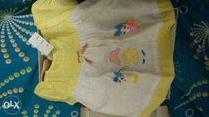 A beautiful yellow dress for kids aging 6 months