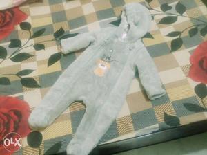 Baby sleep suit with hood.. keeps baby really