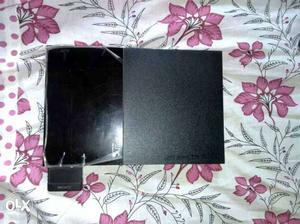 Barand new PS2 with 2 joystic nd 2 games 1 memoricard