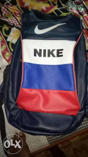 Black, White, And Red Nike Leather Backpack