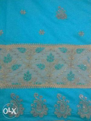 Blue And Gold Floral Textile