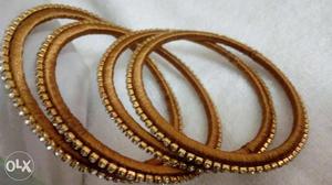 Four Brown Threaded Bangles