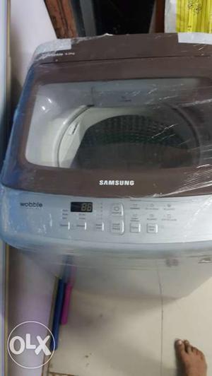 Gray And Black Samsung Top-load Washing Machine