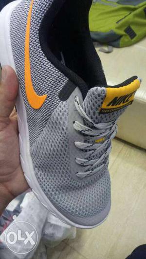 Grey And Yellow Nike Running Shoe