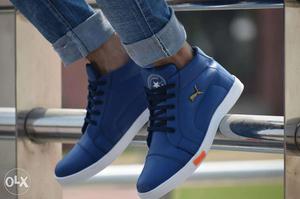 Pair Of Blue Puma Sneakers