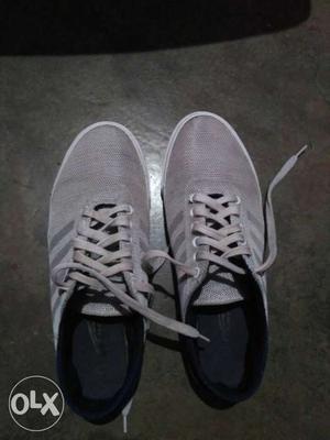 Pair Of Grey Low-top Sneakers