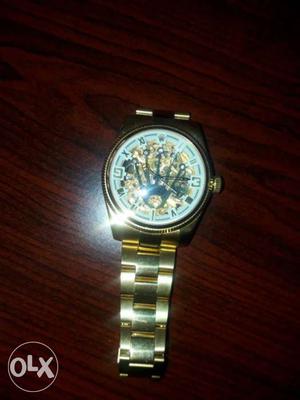 Round Gold-colored Skeleton Watch